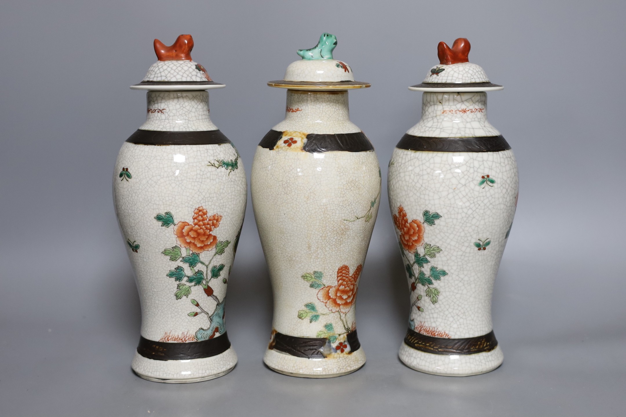 Three Chinese crackleware jars and covers, 26cm